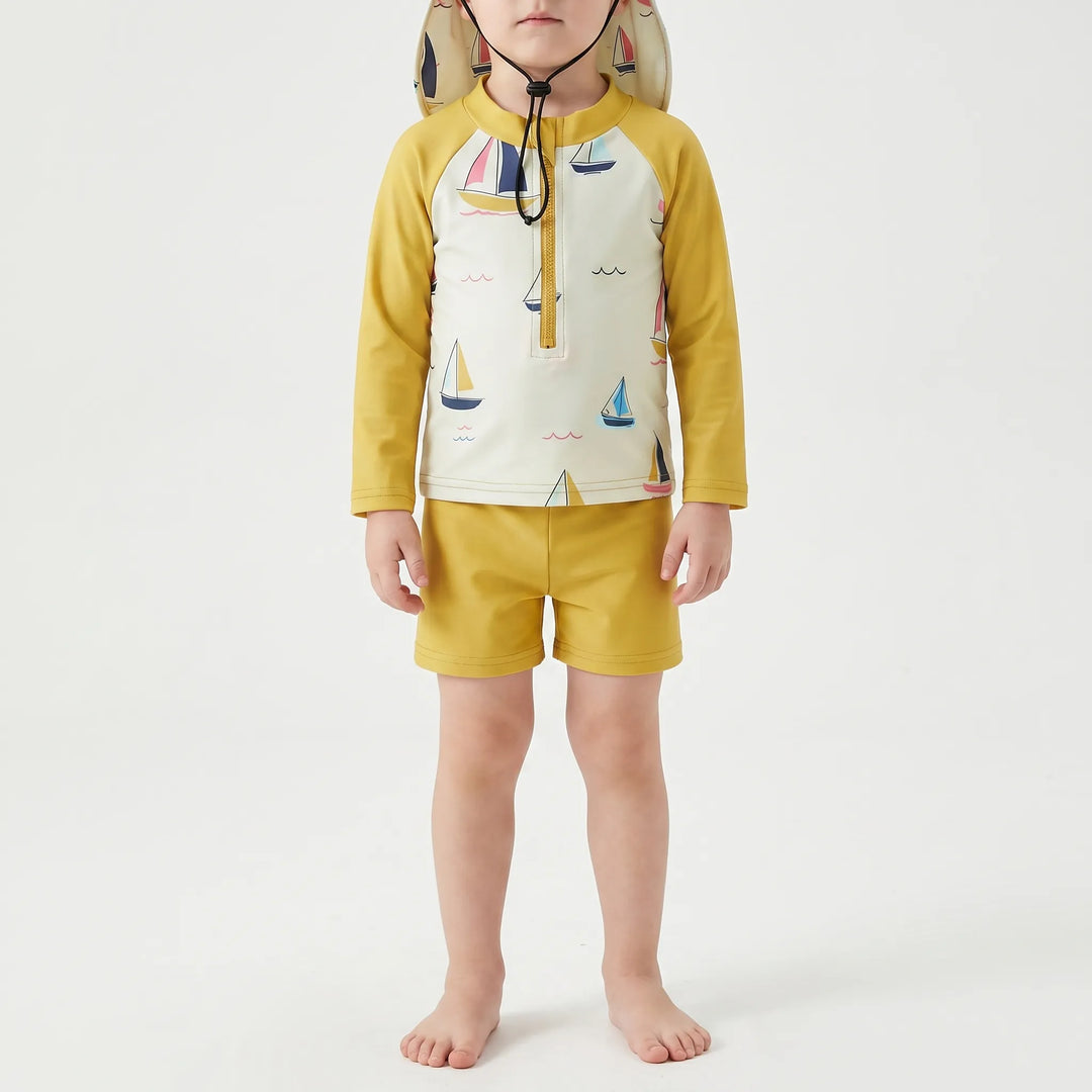 Comfortable toddler unisex long-sleeve swim set, including top, shorts & matching hat, perfect for pool or beach.