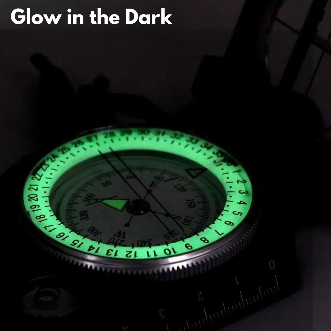 Close-up of TrailGuide military-grade survival compass. Ideal for hiking, camping & outdoor adventure navigation; glows in dark.