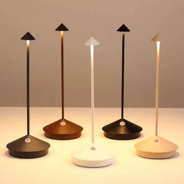 Modern dimmable LED table lamp. Cordless & portable, ideal for versatile indoor/outdoor use.