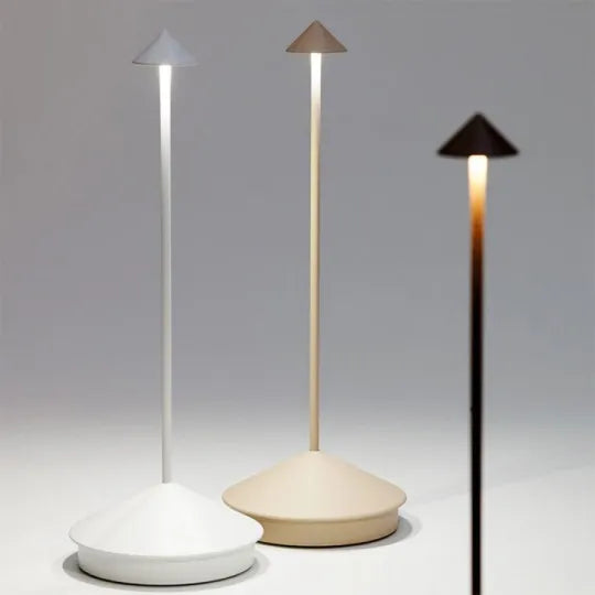 Indoor/outdoor dimmable LED table lamp. Provides tranquil glow, portable for any setting.