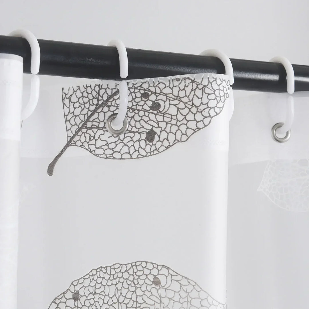 AquaLeaf shower curtain, quick-dry and transparent with a serene leaf motif, includes hooks. Bathroom decor.
