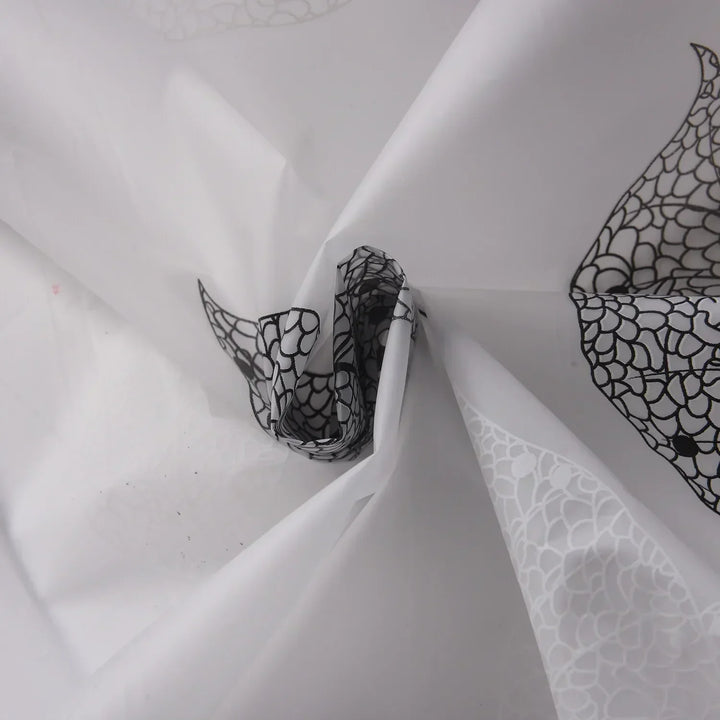 Plastic shower curtain with a stylish aqua leaf pattern, ideal for modern bathrooms. Easy install.