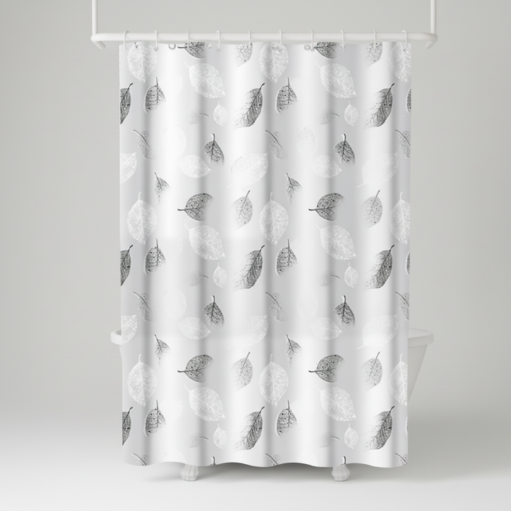 Detail of the leaf pattern on a transparent, quick-dry shower curtain named AquaLeaf. Home Goods decor.