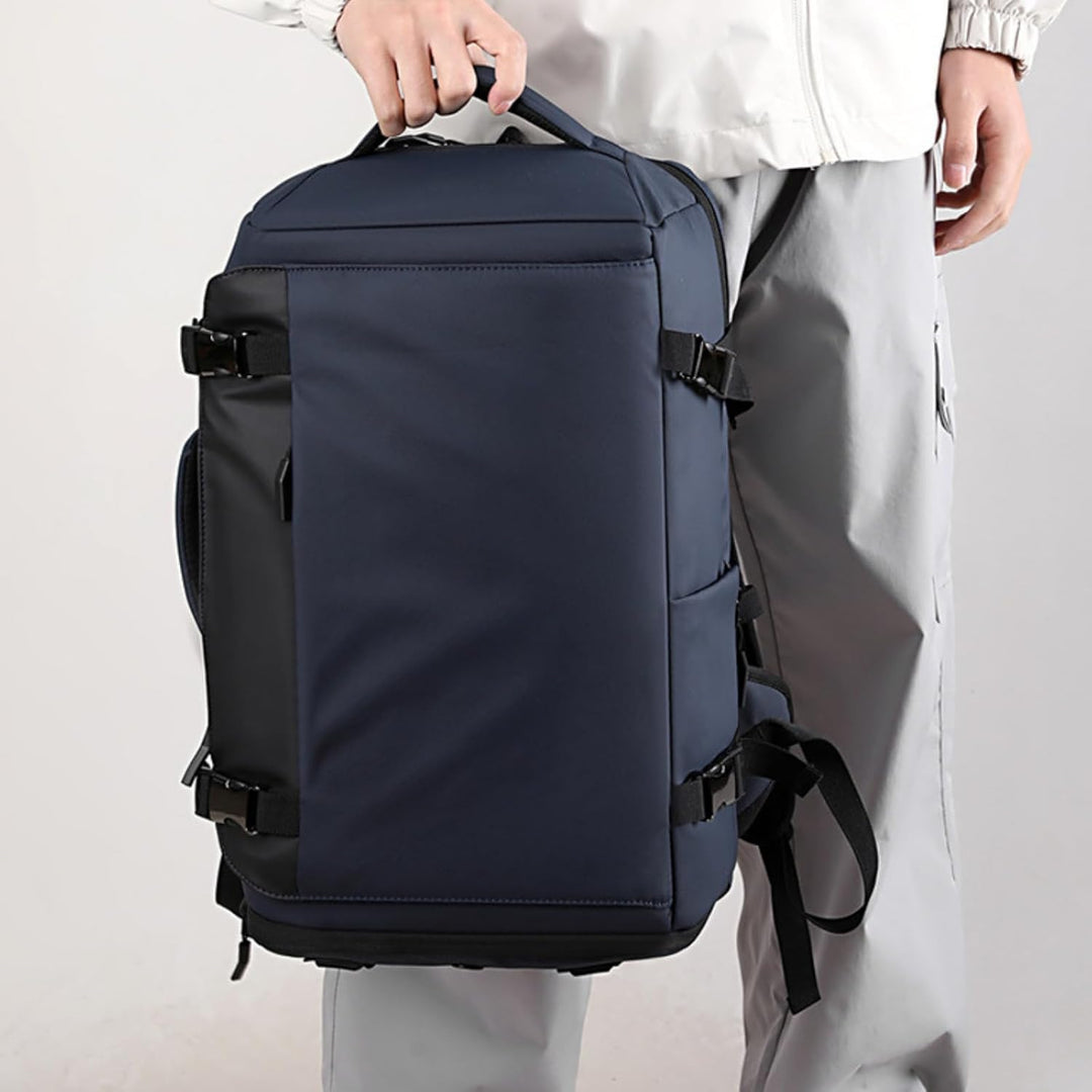 TrekPro 15-inch waterproof laptop backpack in black with side-open design and USB-C port.