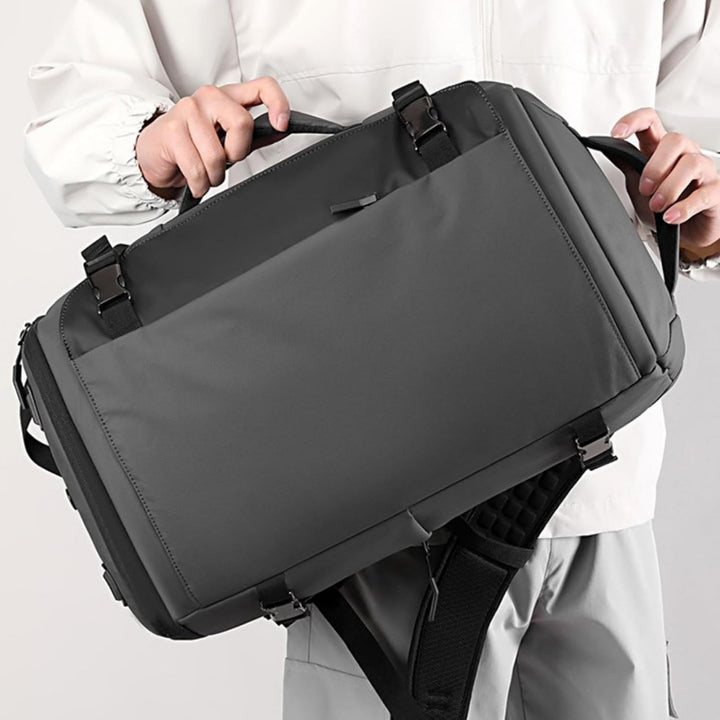 Multiple compartments visible inside the 15-inch TrekPro waterproof laptop backpack.