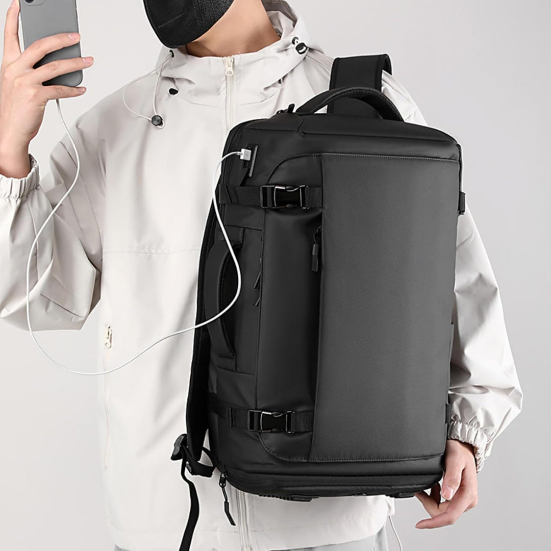 Open side panel of the TrekPro laptop backpack revealing padded 15-inch laptop compartment.
