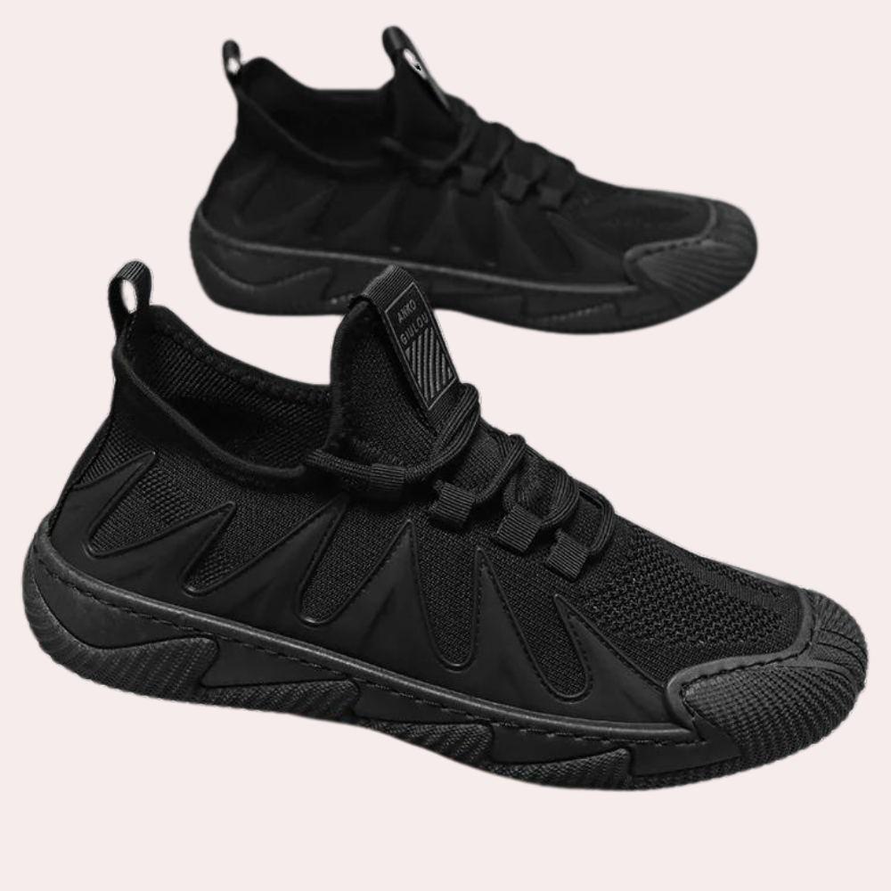 Comfortable slip-on black men's sneakers, lightweight & breathable, ideal for walking & active wear.