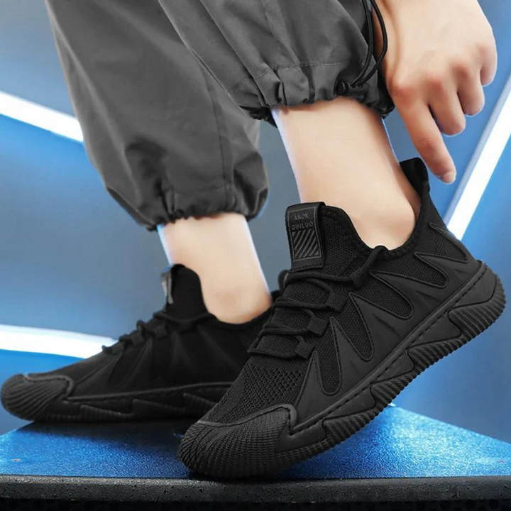 Black men's sports shoes, lightweight & breathable, offering comfort and support for active lifestyles.