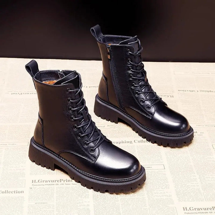 Warm black winter ankle boots for women, featuring a non-slip sole & stylish design for cold weather.
