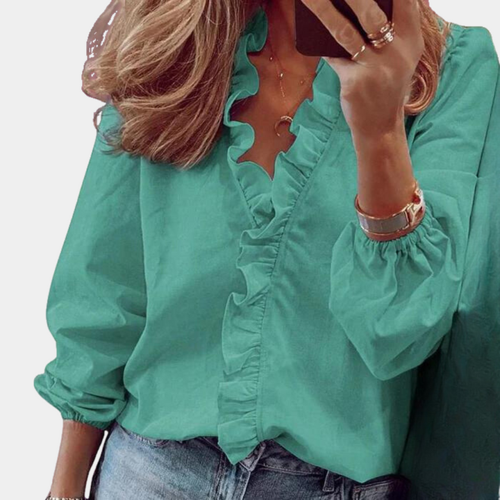 Trendy Isla women's blouse, perfect for versatile fashion; suitable for casual, formal, or workwear elegance.