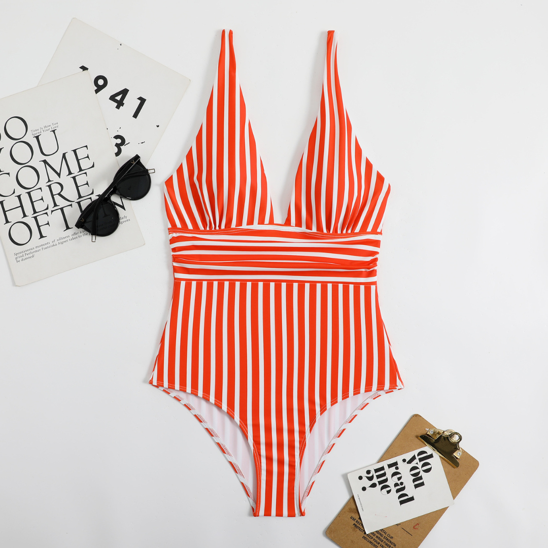 Close-up of the V-neck on a stylish striped swimsuit for women, quick dry fabric