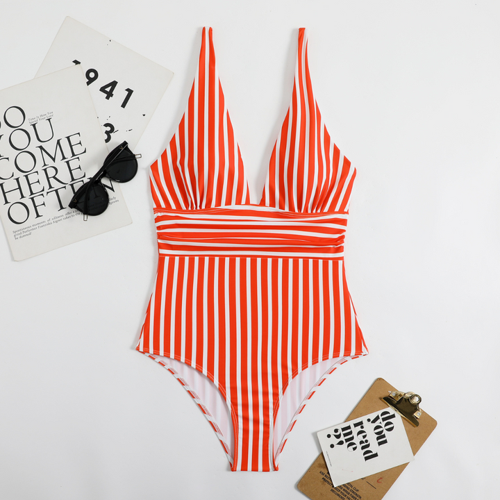 Close-up of the V-neck on a stylish striped swimsuit for women, quick dry fabric