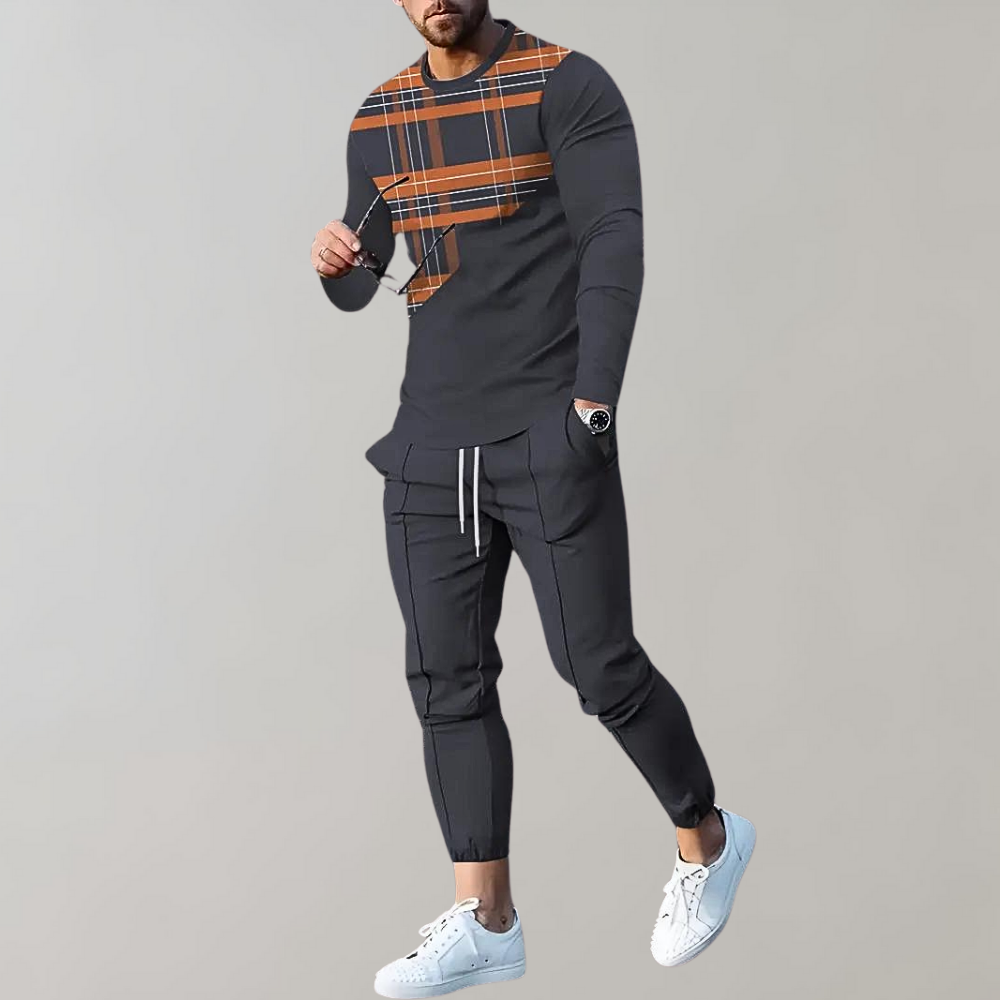 Trendy men's orange 2-piece tracksuit set for urban streetwear. Comfortable athletic activewear.