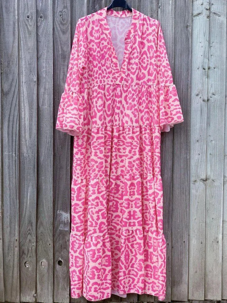 Comfortable & trendy pink leopard print maxi dress for women. Ideal for summer style, bell sleeves add a chic touch.