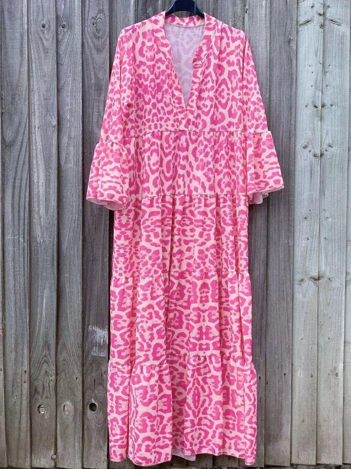 Comfortable & trendy pink leopard print maxi dress for women. Ideal for summer style, bell sleeves add a chic touch.