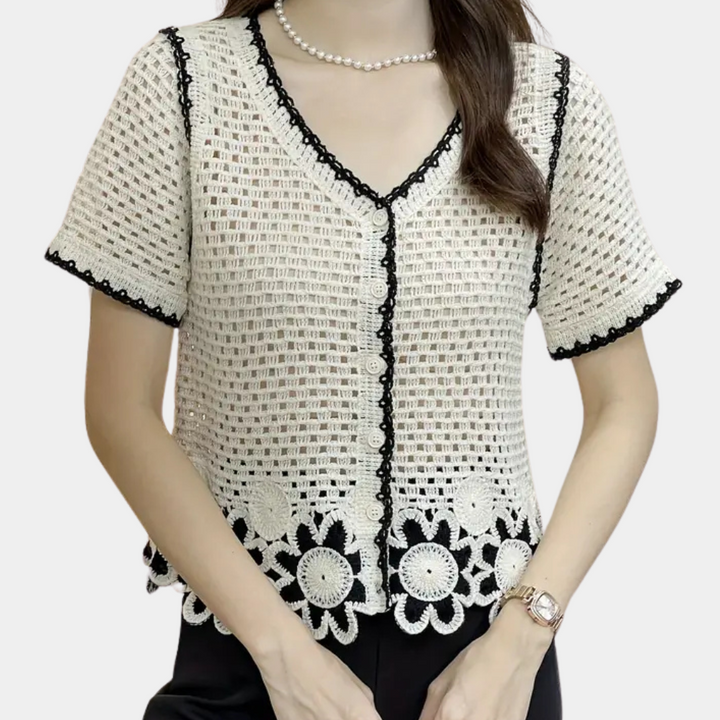 Trendy white openwork lace blouse for women, perfect for stylish summer and spring outfits. Versatile casual elegance.