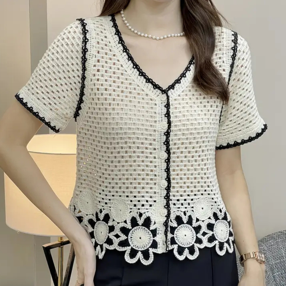 Comfortable women's white openwork blouse, a trendy lace design for spring & summer. Stylish and versatile for any occasion.
