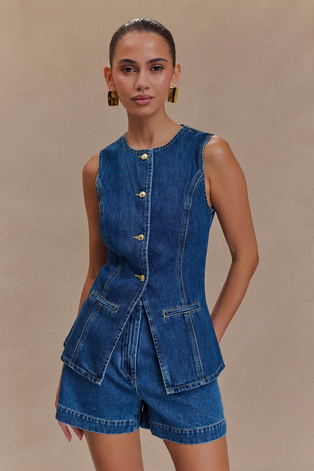 Trendy women's blue denim two-piece set, perfect for a chic casual outfit. Comfortable fashion everyday wear.