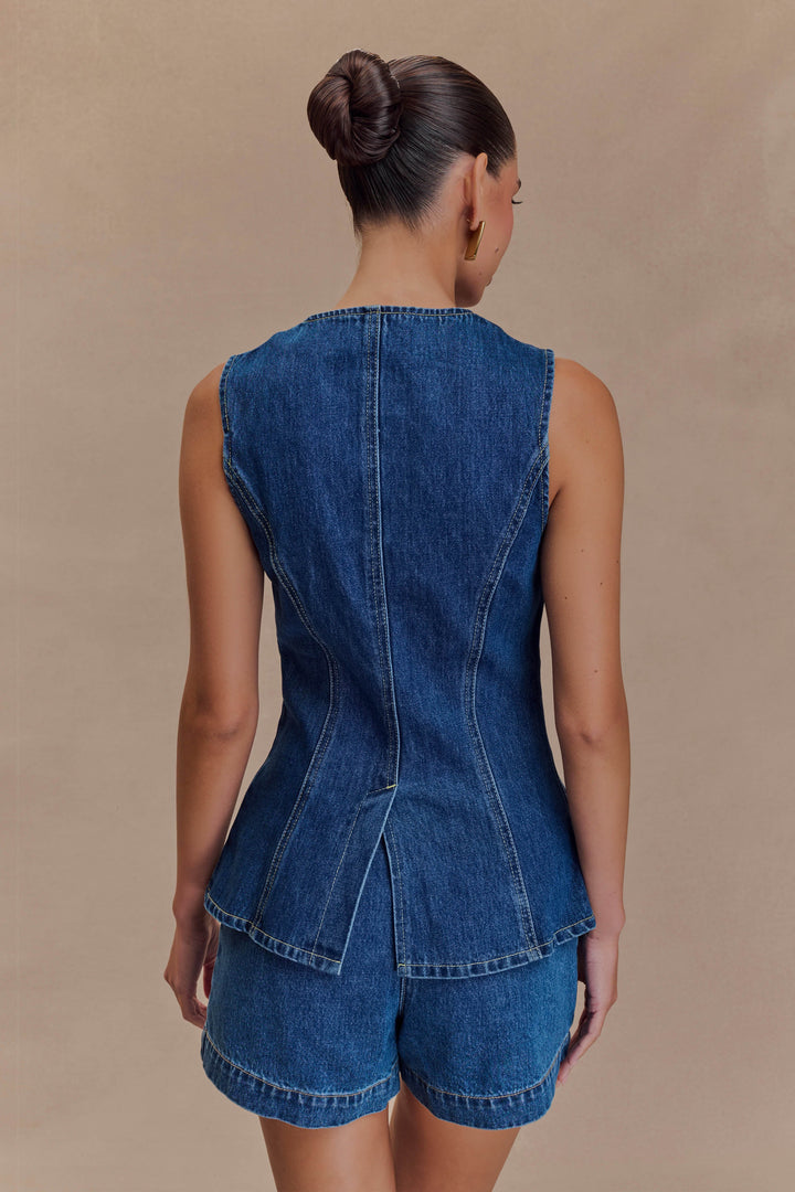 Stylish women's blue denim two-piece set, a comfortable and trendy casual outfit for modern women.