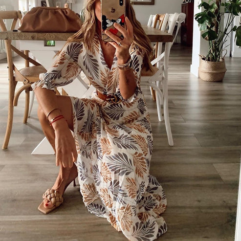 Elegant women's maxi dress for summer parties & vacation. Trendy, flowy evening wear with a flattering silhouette.