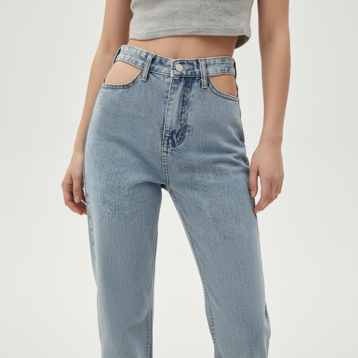 Marina high-waisted cutout jeans in a light wash denim, showcasing modern casual wear.