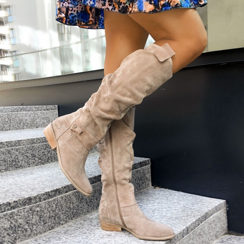 Stylish women's mid-heel boots with a comfortable fit. Perfect trendy footwear for fall & winter.