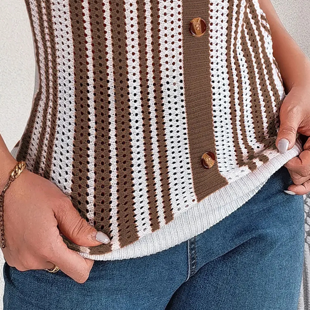 Comfortable women's openwork striped summer top. Breathable, trendy design for casual wear & stylish vacation looks.