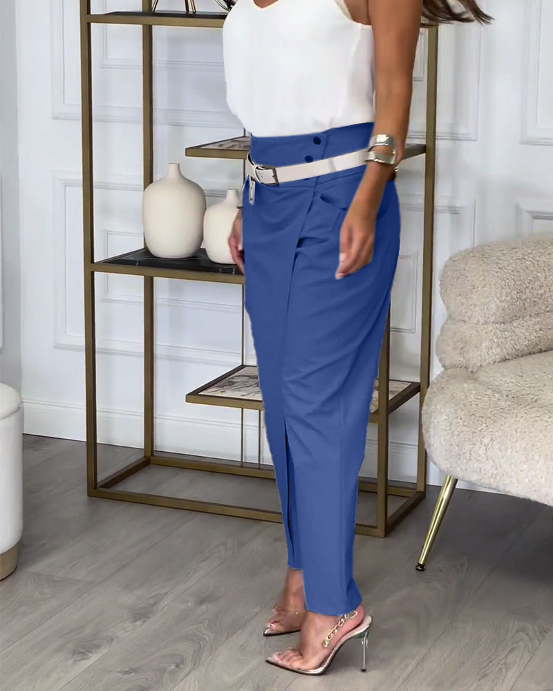 Unique women's patchwork cotton trousers, comfortable belted fashion statement.