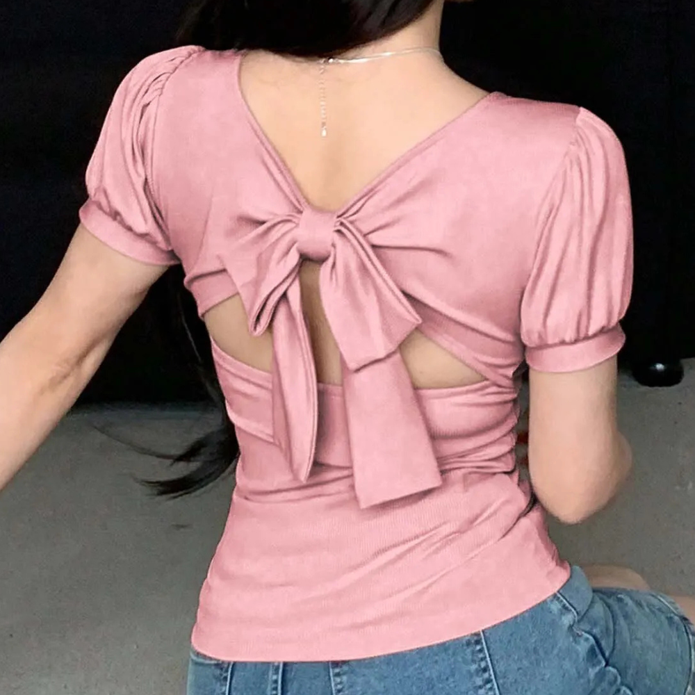 Comfortable and trendy pink women's top, designed with a modern square neck and chic puff sleeves for daily wear.