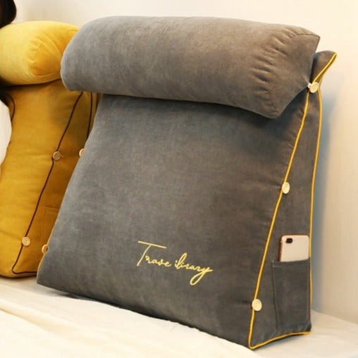Plush triangular back support pillow with memory foam for ergonomic comfort & relaxation.