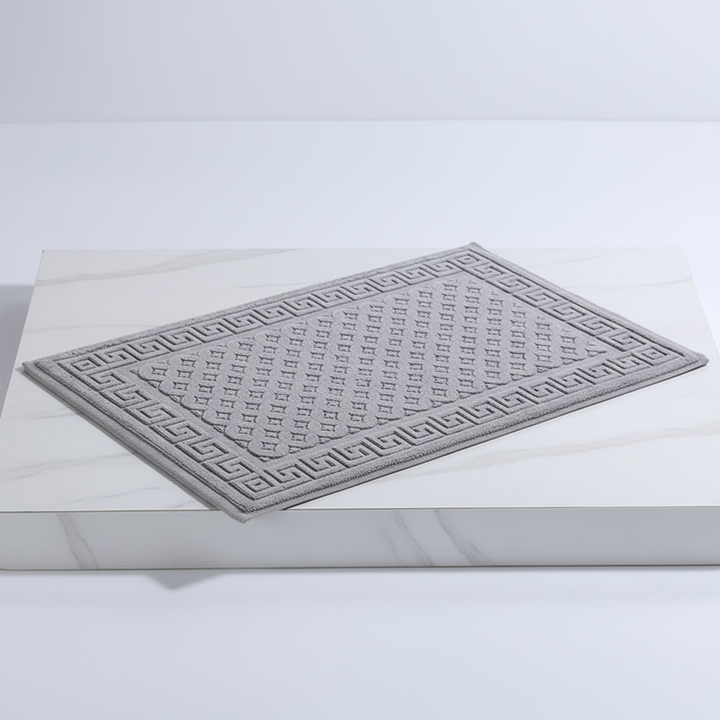Beige & white geometric knitted rectangular bath mat set (2-piece) for a modern bathroom