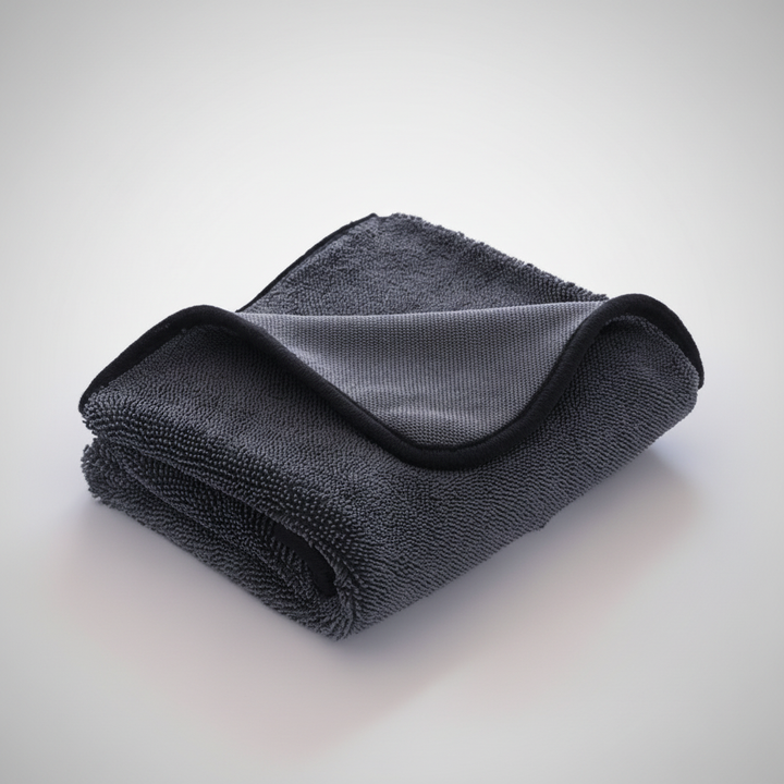 Premium DryMaxPro microfiber drying towel, perfect for car detailing and home cleaning, super absorbent and lint-free.