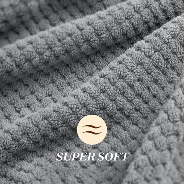 Close-up of plush microfiber fabric, highlighting its ultra-absorbent texture for hair drying.