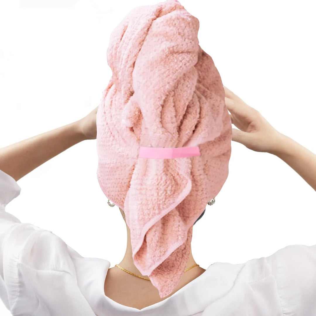Soft pink microfiber hair drying towel, a gentle and quick-dry solution for all hair types.