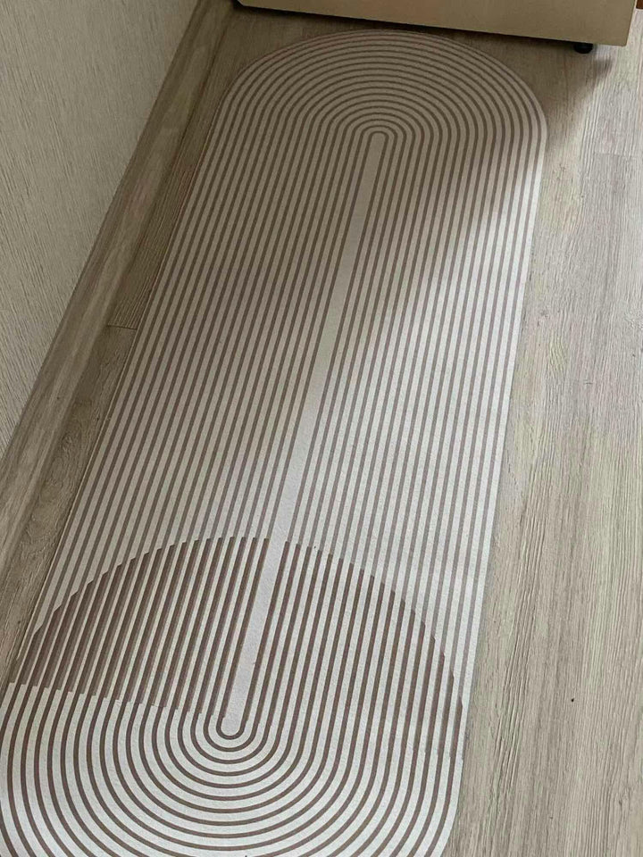 Non-slip entryway floor mat, ultra-absorbent to trap dirt & moisture, washable textile for home.