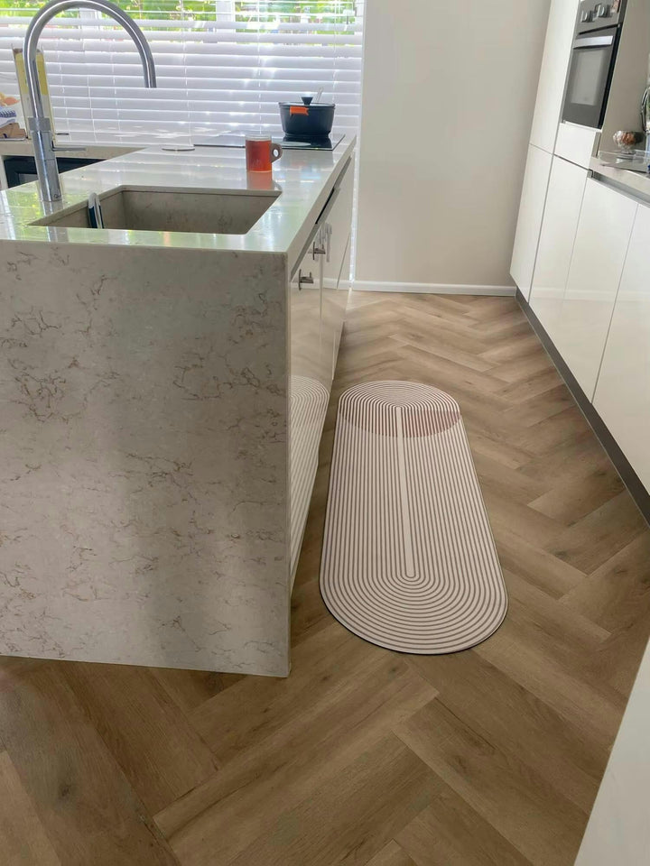 Soft, ultra-absorbent textile floor mat with non-slip backing, ideal for kitchen, entryway & home.