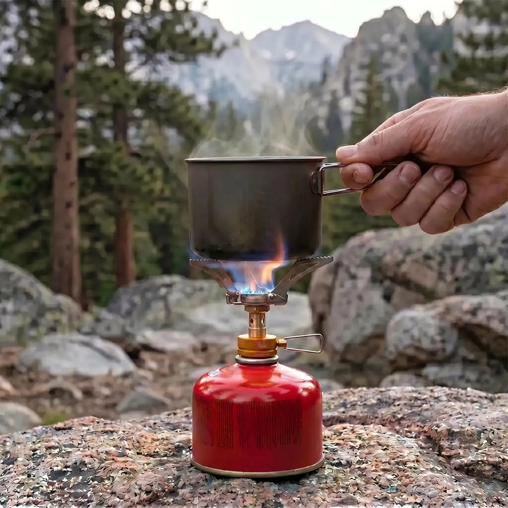 Essential ultralight portable gas burner for camping, hiking & outdoor cooking. Reliable travel stove.