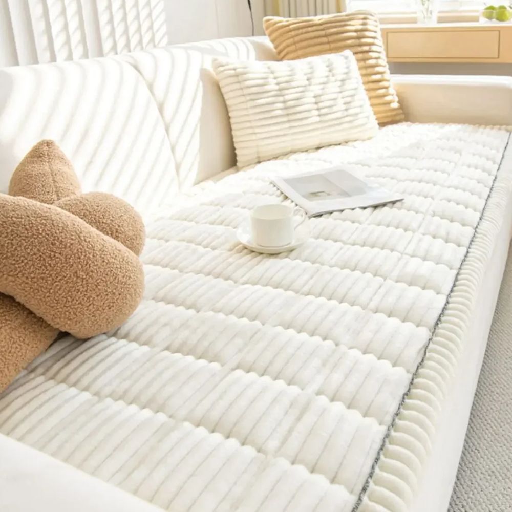 Non-slip couch slipcover, a durable furniture protector for living rooms. Enhances decor with plush comfort.