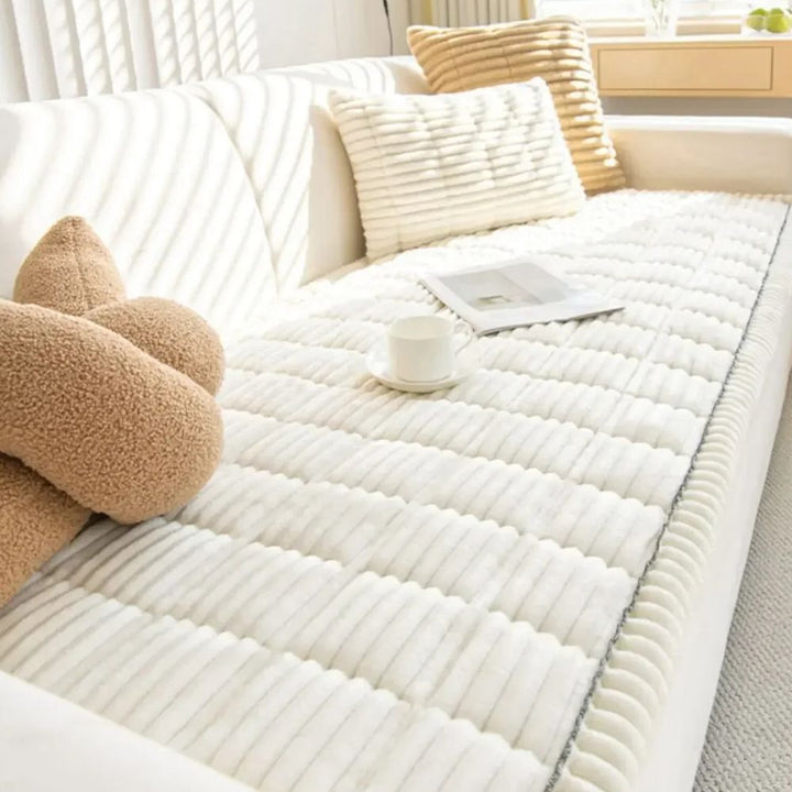Non-slip couch slipcover, a durable furniture protector for living rooms. Enhances decor with plush comfort.