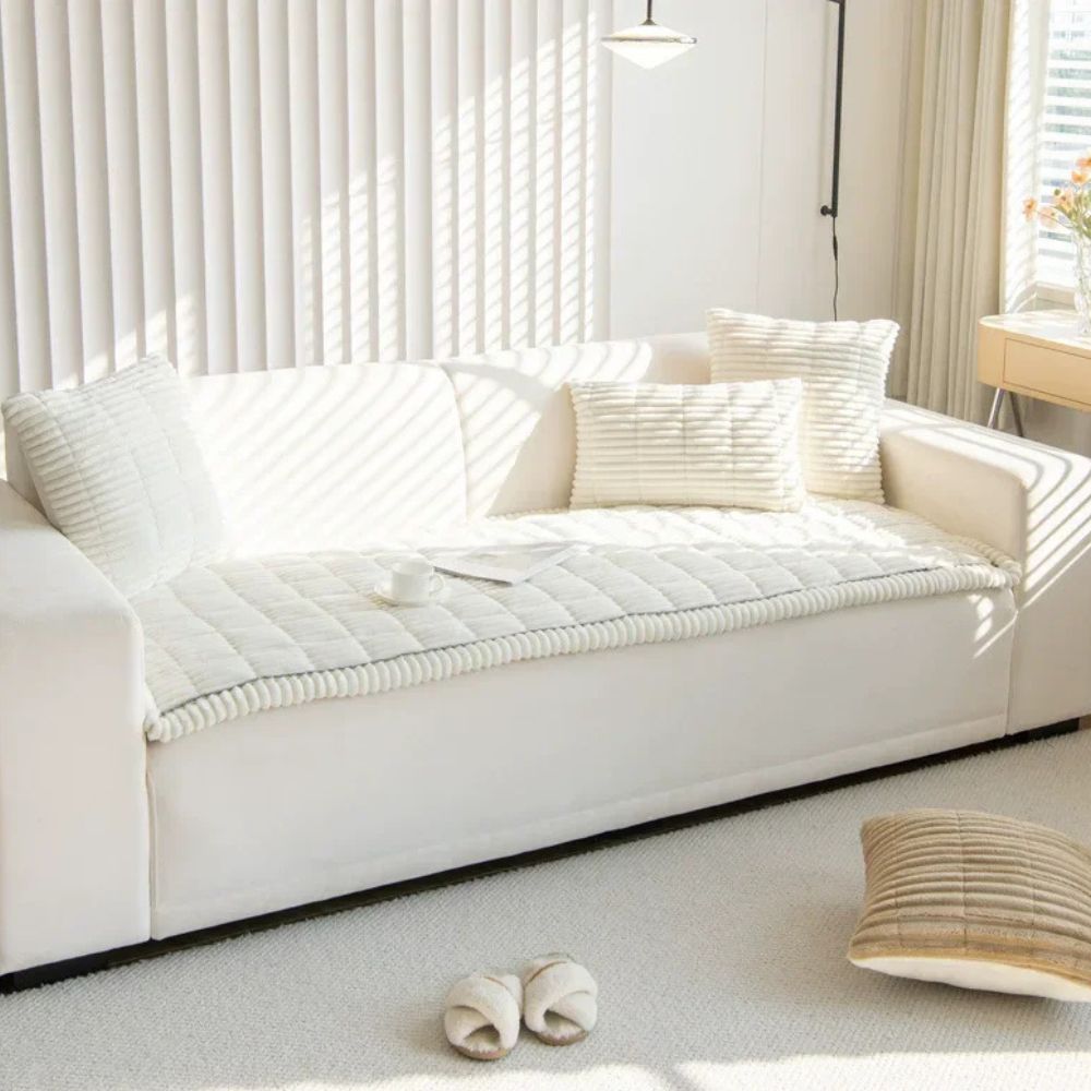 Washable polyester sofa cover for ultimate comfort & protection. Pet-friendly, non-slip, and stylish.