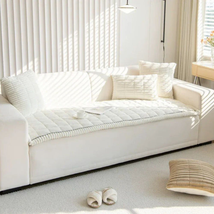 Washable polyester sofa cover for ultimate comfort & protection. Pet-friendly, non-slip, and stylish.