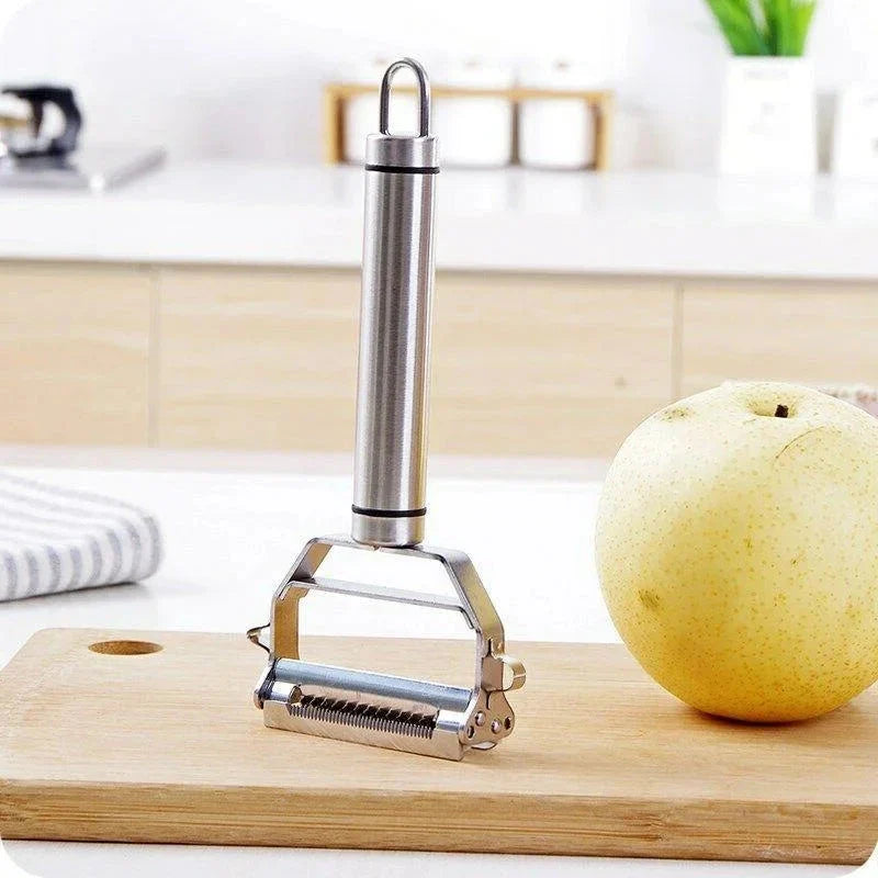 Durable stainless steel multi-function kitchen tool: sharp vegetable peeler, julienne cutter, and grater.