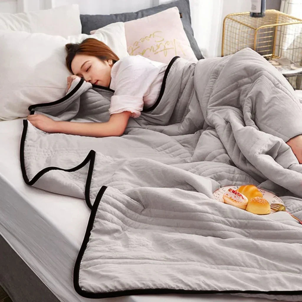 Ultra-soft breathable cooling blanket for summer. Lightweight bamboo & cotton blend for refreshing sleep.