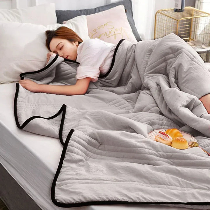 Ultra-soft breathable cooling blanket for summer. Lightweight bamboo & cotton blend for refreshing sleep.