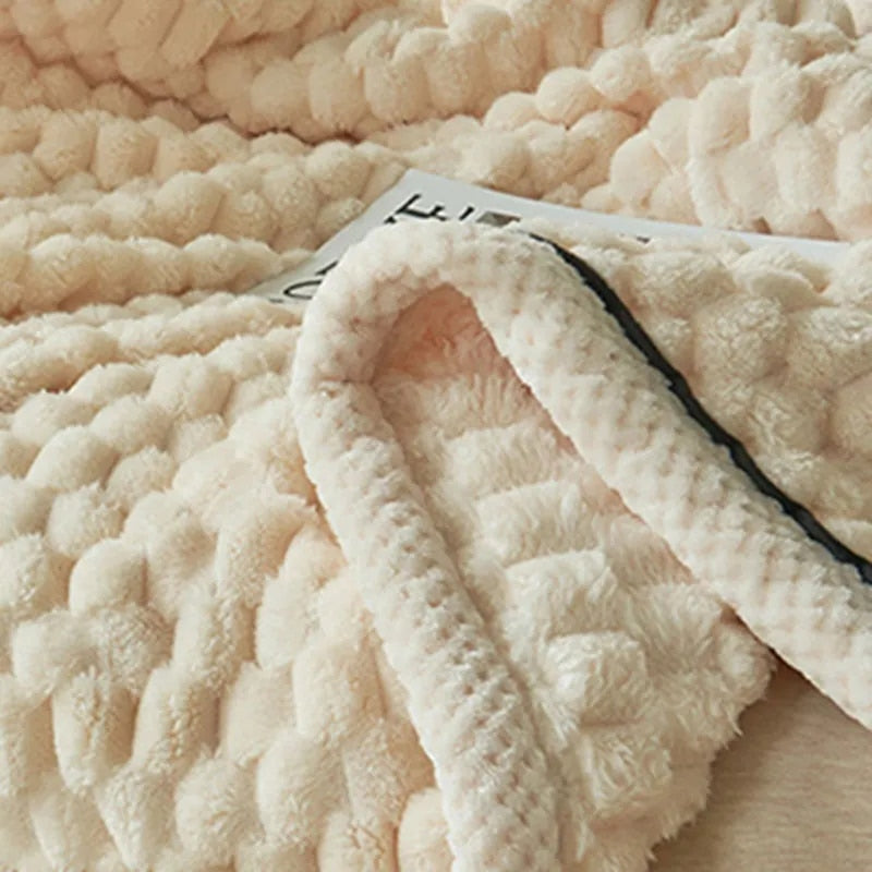 Soft & warm flannel fleece throw blanket in a neutral shade, enhancing living room or bedroom comfort.