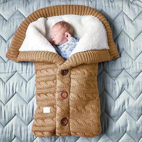 Snuggly unisex fleece baby blanket providing ultimate comfort for newborns and babies during sleep.