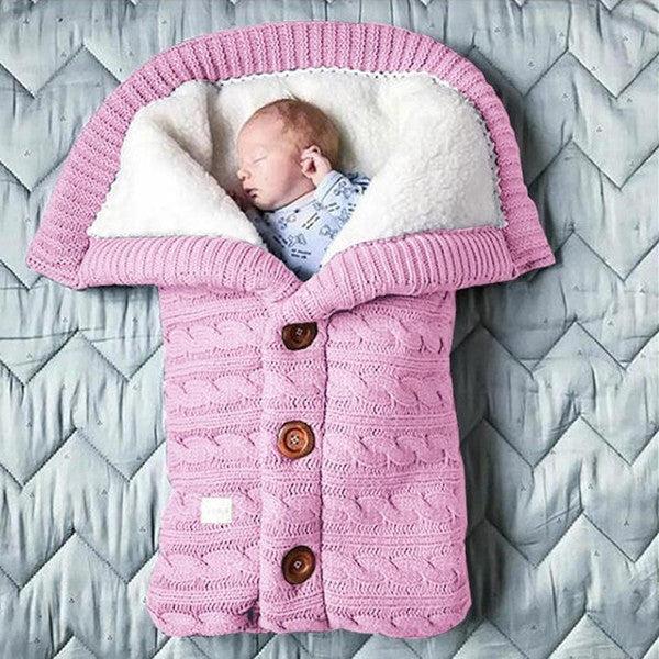 Plain, soft fleece baby blanket, a newborn essential for cozy comfort & sleep in any nursery.
