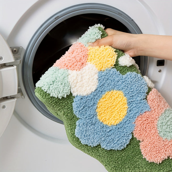 Knitted floral bath mat, super absorbent and soft, ideal home textile for comfort.