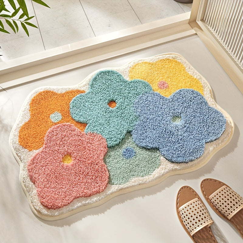 Non-slip floral bath mat, highly absorbent and plush, enhances bathroom decor.
