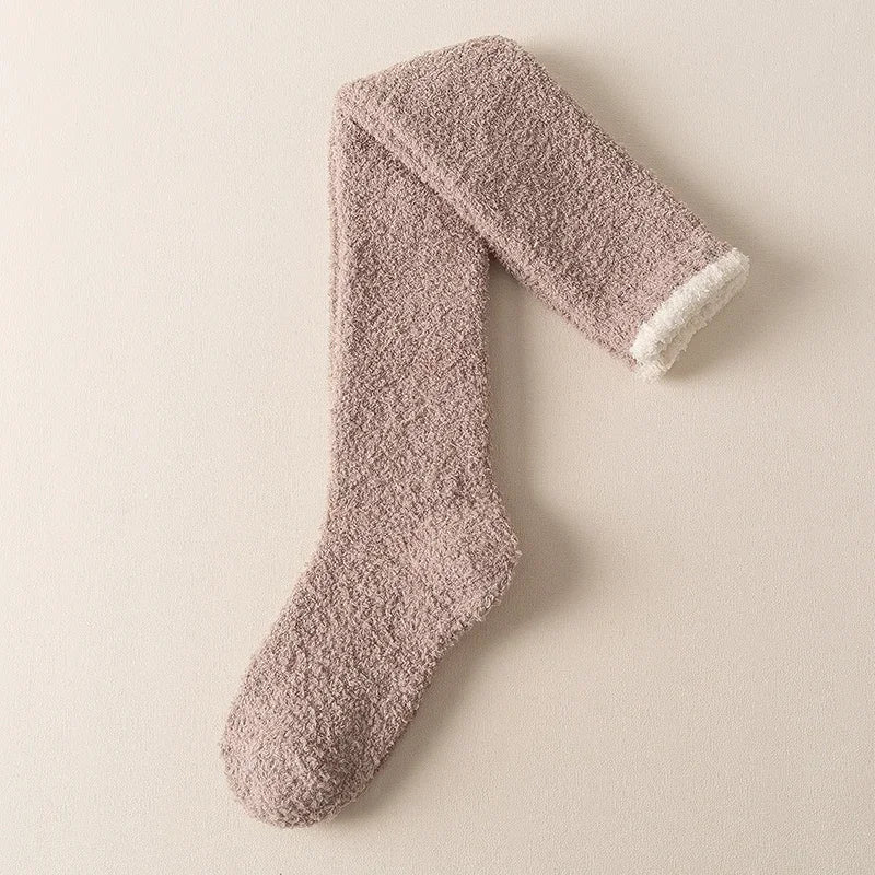 Warm women's fuzzy knee high socks, ideal for cozy evenings & winter comfort.